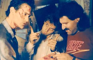 Greg Nicotero Instagram - So I downloaded a negative scanning app and started digging into my old stacks of negatives.  #evildead2 with @hoops511 touching up @shemp_malone evil hand under the supervision of the brilliant #samraimi  MORE TO COME #makeupfx