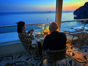 Gregg Wallace Instagram - sunset over Positano @edenrocpositano
