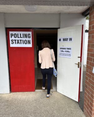 Gyles Brandreth Instagram - I took this snap of my daughter going into the polling station yesterday. I’m thrilled & proud she’s won her seat in parliament. She will work so hard for everyone in Chester South & Eddisbury. She’s her mother’s daughter: simply the best. Congratulations @AphraBrandreth
