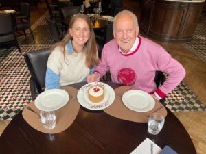 Gyles Brandreth Instagram - The entire @therosebudpodcast team has been celebrating our brilliant producer Harriet’s birthday.  Look what our fabulous sponsors @Grosvenor_House gave Harriet! They’re the best. So is she. 🎈(The entire team is in the photograph btw)