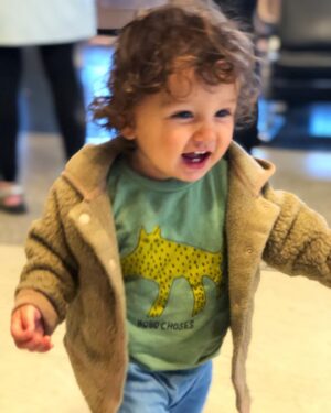 Hanna Mangan Lawrence Instagram - *getting deep alert* 
I’ve had the best few days, filled with more love than I thought possible. I entered the last year of my twenties and our boy turned one! ONE! Omar took me to see Patti Smith and it brought on some serious emotion. And it got me thinking - I remember my Mum returning from a Patti Smith concert when I was young, and her telling me that she got so emotional that she cried. At that age I thought she was a complete lune for being that emotional at a concert. But the other night, while sitting in the beautiful Walt Disney Hall, Patti Smith started singing ‘Dancing Barefoot’, and I too started crying; I was so overwhelmed - with joy. Maybe it was everything wonderful that had happened to me this last few years hitting me at once. It felt surreal, I just closed my eyes and felt a kinda peace; I’m so grateful for this life and especially for the people I get to share it with. So, sorry Mum for judging you when I was 12 - I now get it! Thanks Omar for being the most loving human and giving me Romi. And thanks Romi for being the best lil guy! We LOVE LOVE  LOVE you 😍 💛🧡