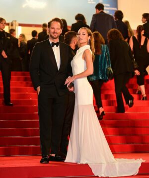 Hanna Oldenburg Instagram - @festivaldecannes premiere of THE GIRL WITH THE NEEDLE 🎥 by @magnusvonhorn 🤍 Thank you for taking me @filmingthomas 🌟🙌🏽 The film was beautiful and a very uncomfortable watch. Highly recommend! 

This was a last minute invite - from sleeping in bed, to the screening in just 70 min’s. Jumped into the shower. Did my hair and makeup in the car, called @justinebleicher who was in the middle of dinner. She picked out this outfit in 10 min’s. She even sewed it in!! @linebrusegan took photos while I was throwing myself into a car. Then RAN to the Grand Palais in high heels (as per usual). 

Arrived sweaty, but just in time. Everything is right on time. If you’re spontaneous, good things happen. We went to @hotel.martinez_cannes, then on a boat called #ije, and I met really fun and cool new friends and colleagues. We laughed and we felt alive. 🔥💃🏽

Photo: @matthieumunoz 
Stylist: @justinebleicher 
Dress: @harithand 
Bag: @louboutinworld 
Shoes: @louboutinworld 
Hair & Makeup: by me in the @uber 🚗💨

.
.
.

#festivaldecannes #harithand #louboutinworld #louboutin #redcarpet #redcarpetfashion #redcarpetstyle #cannes #cannesfilmfestival #festivaldecannes2024 #hannaoldenburg #actress #matthieumunoz #thegirlwiththeneedle #magnusvonhorn #ije #ijeyacht #thomaspierce #trinedyrholm #frenchriviera #cotedazur #actor #film #movies #cinema