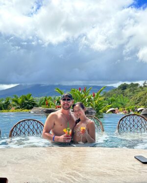 Hannah Bamberg Instagram - L I S T E N Linda! Your next vaca MUST be in Costa Rica. Here’s why…

If you are looking for your next family vacation or honeymoon @thespringscostarica is a great option🌋The resorts sits at the base of a volcano and has over 20 natural hot springs surrounded by lush jungle. You can go white water rafting, ride horses, fish in the river or watch a lion feeding at the resorts wildlife sanctuary which sits at the base of the resort on a river. The resort has multiple fine dining restaurants, but me and Ian spent most of our time at the swim up bar drinking mimosas and eating sushi (they have GREAT sushi) 

The wild life is impeccable. We saw up close wild monkeys, sloths, toucan and more! 

The staff was amazing and Ian and I will defiantly be back!! Thank @thespringscostarica for a mind blowing trip! #costarica #travelcostarica #lafortuna #lafortunahotsprings #costaricapuravida