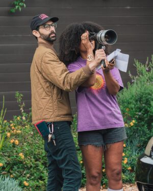 Hayley Marie Norman Instagram - This week I wrapped production on my directorial debut; a film that I also wrote and star in. The opportunity to tell my stories has been a long time in the making and I’m so excited that my dreams are coming to fruition. I am in awe of my incredible cast, crew, and producers- without which none of this would have been possible. Thank you a million times over. 🙏🏾 
Directed/Written/Starring/EP: ME, bitches (hehe)
EP: @beetsaladbar 
EP: @ingridhaas 
Producer: @elishayaffe @cultstatus.tv 
Cinematographer: @g.e.g.s 
1st AD: @cutterwhite 
Script Supervisor : @vaalenglish 
Production Designer: @thearvnk 
Sound: @vered13 
Hair/Makeup: @tealmuah 
1st AC: Brett Checkelsky
2nd AC: @duhblackpopulist 
PD asst: @benverde_ 
Gaffer: @chrisbonddp 
Key Grip: @cherrybomb_omb 
Assoc Producer: @goodiemang 
2nd 2nd: @beardjam 
Production Asst: @herbiefullerloaded 
Assoc Producer: @jessicerra13 
Production Asst: @goodusername 
CAST: @leogonzall @rachael.drummond @verbalberappin @vanessalchester 
Special thank you: @wemakemovies 
BTS PHOTOS: @jill.petracek @karolinabryner
