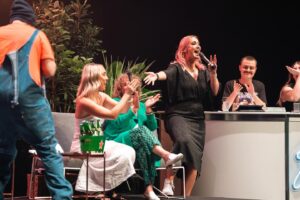 Hayley Sproull Instagram - Pics or it didn’t happen 🤩🎭✨ 

We loved celebrating Fletch & Vaughan’s 20 year anniversary at the beautiful Civic Theatre 🫶

Also yes Hayley is holding exactly what you think 🍆👀

(Don’t worry Christchurch pals, pics to come 🤩)

📸: @beanstalk.cr