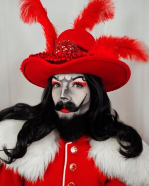 HercuSleaze Instagram - From Dr. Seuss’ The 500 Hats of Bartholomew Cubbins, I present King Derwin!🔺👑🔺This book is one of Seuss’ lesser knowns because it’s kinda violent and there’s no moral in the end, but I remember it fondly from my childhood because I loved the progressively fancier hats!! It was published in 1938 and this look is the closest thing I’ll do to a pop culture reference lol

🔺Hat by me
📸 by me

#dragking #dragkings #dragartist #malecontour #maleillusionist #dragkingmakeup #femmeking #localdrag #montrealdrag #dragmtl #canadiandragking #canadiandrag #instadrag #dragphotography #androgynous #genderbender  #queerart  #dragkingsofinstagram #dragkingvisibility #alldragisvalid #canadianmua #drseuss #drseusscostume #bartholomewcubbins #redhat