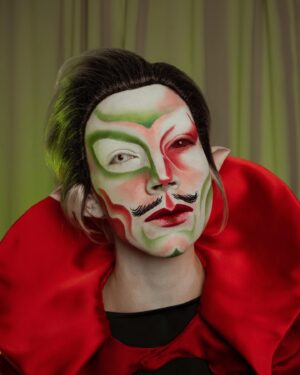 HercuSleaze Instagram - The Christmas WIZARD !!!???🎄 if Santa can be a thing than so can this guy 💁🏻

For the shape of the eye makeup I took inspiration from @xochelseaboy, from a look they posted in March 2021. I very rarely do asymmetrical looks, this was super fun (and considerably easier than trying to mirror the design on both sides!!) 

📸 by me
🧵cape by me

#dragking #dragkings #dragartist #dragqueen #dragula #malecontour #dragkingmakeup  #montrealdrag #dragmtl #canadiandragking #canadiandrag #instadrag #dragphotography #genderbender #queerart  #dragkingsofinstagram #dragkingvisibility #alldragisvalid #canadianmua #christmasmakeup
