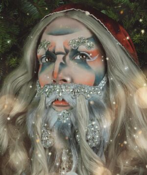 HercuSleaze Instagram - 🎅🏻 May your holidays this year be jolly and safe! ❤️🎄❤️ I upcycled these pics from last year because I’ve been busy with other looks!

🧔🏻‍♀️ Beard by me
📸 Photos by me

#dragking #dragkings #dragartist #montrealdrag #dragmtl #canadiandragking #canadiandrag #alldragisvalid  #homemadebeard #genderbend #christmasdrag #santacostume #santadrag
