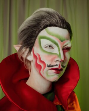 HercuSleaze Instagram - The Christmas WIZARD !!!???🎄 if Santa can be a thing than so can this guy 💁🏻

For the shape of the eye makeup I took inspiration from @xochelseaboy, from a look they posted in March 2021. I very rarely do asymmetrical looks, this was super fun (and considerably easier than trying to mirror the design on both sides!!) 

📸 by me
🧵cape by me

#dragking #dragkings #dragartist #dragqueen #dragula #malecontour #dragkingmakeup  #montrealdrag #dragmtl #canadiandragking #canadiandrag #instadrag #dragphotography #genderbender #queerart  #dragkingsofinstagram #dragkingvisibility #alldragisvalid #canadianmua #christmasmakeup