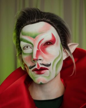 HercuSleaze Instagram - The Christmas WIZARD !!!???🎄 if Santa can be a thing than so can this guy 💁🏻

For the shape of the eye makeup I took inspiration from @xochelseaboy, from a look they posted in March 2021. I very rarely do asymmetrical looks, this was super fun (and considerably easier than trying to mirror the design on both sides!!) 

📸 by me
🧵cape by me

#dragking #dragkings #dragartist #dragqueen #dragula #malecontour #dragkingmakeup  #montrealdrag #dragmtl #canadiandragking #canadiandrag #instadrag #dragphotography #genderbender #queerart  #dragkingsofinstagram #dragkingvisibility #alldragisvalid #canadianmua #christmasmakeup