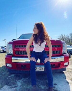 Holly Deveaux Instagram - Shameless photoshoot with my character’s truck - a red Chevy with what I am told is corvette engine. Killer sound. I know nothing about cars (I prefer horses) but it left @maxinedenis in the dust several times. 

@polarized_movie