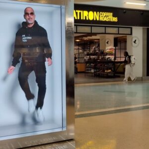 Howie Mandel Instagram - The great Howie Mandel just beamed 3,000 miles from Los Angeles to a Proto Hologram display permanently installed at JFK Airport Terminal 4 in New York to interact with fans remotely. It was insane and entertaining!!

Which interaction was your favorite? Mine is the Riverdance guy. Haha hilarious 🤣 

This announcement marks the first free-standing, life-like hologram device in an airport is at JFK Terminal 4. Proto Hologram technology was installed there last year but we are only officially announcing it now. 

“Excited about traveling through JFK Terminal 4 today. My airline of choice is Proto,” said Howie Mandel. “I love to travel without traveling – Beam me there!”