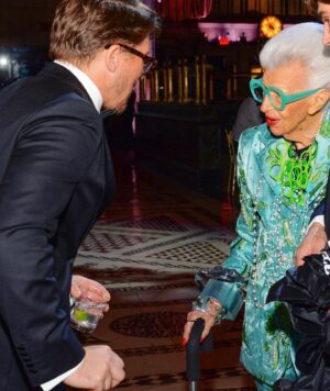 Hugh Sheridan Instagram - Love you darling Iris. The epitome of legendary. Style, class and can dance!!! Loved every time I got to sing for you and spin you around xxx @iris.apfel ♥️ 💄 💎 #rip