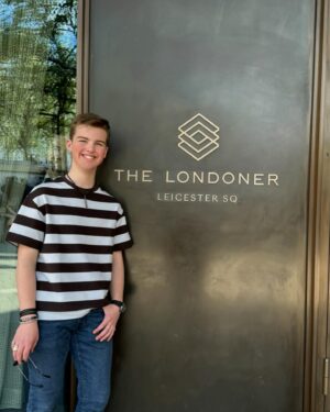 Iain Armitage Instagram - I get so happy when I see this distinctive and beautiful blue color because I know it means I will soon be in my London home, @thelondoner ! I appreciate the location- it’s right by all the theatres- but I appreciate the kindness of the people who work there even more. In these pictures you will see Mr William and Mr Shane- they are just two of many people who do so much to make a stay perfect. I joke that I need a friends and family discount rate because they feel like family here- I just love it! Maybe it’s because I’m a Londoner?!