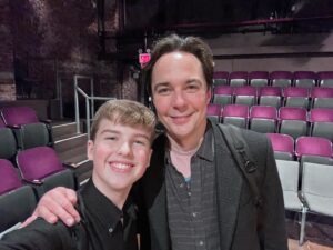 Iain Armitage Instagram - And here is the whole reason I went to NYC! It’s one of my favorite places to go in the autumn, so I’m always looking for an excuse to get there. When I heard that @therealjimparsons was appearing on stage in @classicstage ‘s production of Man of No Importance, I knew I had to get there. I ended up sitting in the front row for a preview performance and it was so, so, so great! Jim is astonishing and he’s surrounded by an incredible cast. Honestly, I want to go back and see it all again! Have you seen it? Will you get to? Please let me know! Jim plays Alfie, a theatre loving bus conductor in Dublin in 1964 in this musical. And we watch as he wrestles with his faith, his beliefs and his judgements. It’s sweet and simple and powerful, and you’ve never seen Jim Parsons in a role like this. I feel so lucky and happy that i got to go! “You just have to love who you love.” - Alfie.  Also, I was so happy to see Jim again!!!