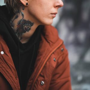 Indiana Black Instagram - Americana neck tattoo. A lion with a crown standing on a rose. I forget I have it so often but then I get the odd stare walking down the street and am reminded again.