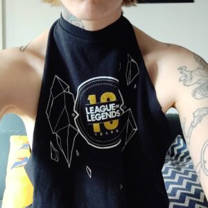 Indiana Black Instagram - I cut up the t-shirt. Trying to figure out different ways to repurpose and style t-shirts since I have so many. I'll be honest, definitely cut this one up too much for public wear. It'll probably just be a lounge shirt or ridiculously hot day shirt as it shows way too much side boob for public setting. 
But I think the neckline shape looks really good on my shoulders because it's such a traditional feminine shape but my tattoos make it very edgy and masculine. I'll continue to experiment with different shapes.