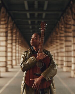 Irma Pany Instagram - Strumming my heartstrings under this bridge like 🙄
#theystillhaventcalled #atleastimadeasongoutofit 
📷 @elliot.aubin 🙏🏿
.
.
.
.
#irmamusic #bercy