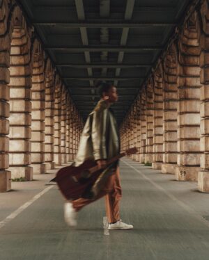 Irma Pany Instagram - Strumming my heartstrings under this bridge like 🙄
#theystillhaventcalled #atleastimadeasongoutofit 
📷 @elliot.aubin 🙏🏿
.
.
.
.
#irmamusic #bercy