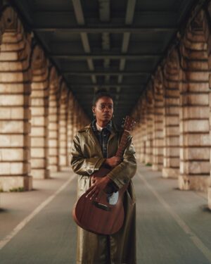 Irma Pany Instagram - Strumming my heartstrings under this bridge like 🙄
#theystillhaventcalled #atleastimadeasongoutofit 
📷 @elliot.aubin 🙏🏿
.
.
.
.
#irmamusic #bercy