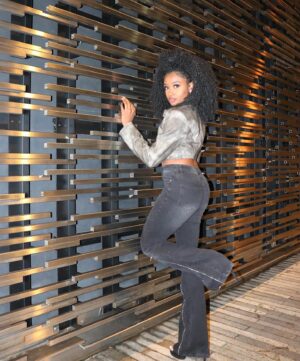 Iyana Halley Instagram - The best thing about being authentic is you don’t have to keep up an image 🤍💫😌 @FashionNova 

-Western Swing Faux Leather Top x Tell Everyone Flare Jeans-