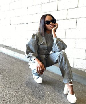 Iyana Halley Instagram - stock been up over here 😏🤍📉 @FashionNova

Outfit: Aria Utility Jumpsuit 🫶🏾