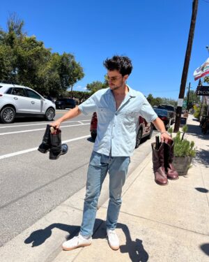 Jack Falahee Instagram - Cowboy boots and wine.