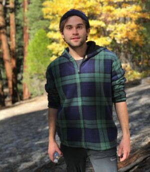 Jake Borelli Instagram - Throwback to the Costco sweater that got me through my 20s 🍁🌿🍂 (And she’s still holding on)