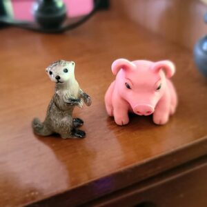James A. Janisse Instagram - These dudes live on my desk because they're two of my favorite animals. Got the otter yesterday at the LA Zoo and @carebecc made the pig for me cause she can do shit like that. It's awesome.