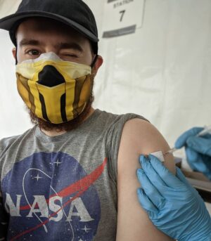James A. Janisse Instagram - I'm gonna pretend I was intentionally winking rather than unintentionally reacting to the needle going into my arm. In any case, in 2 weeks I'm good to go! #PfizerPfam