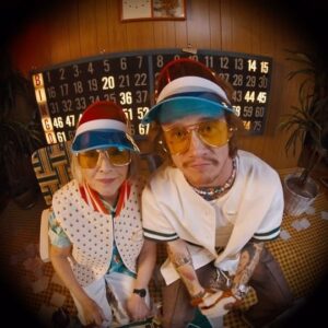 James Ford Instagram - Welcome to the wild world of Grandma’s Kid 😎

Over the last 6 months I spent every penny I’ve ever had, and made a big bingo gamble on a *real* collection. 18 pieces that all go together and build a wardrobe. Shoutout to the Los Angeles factories who also took a gamble on little old me. I had a blast designing and launching this. This video is a one-minute long peek into what it’s like @rowenasocialclub If you like it, share it with a friend. Feel free to tag yourselves, I’m the pile of cookies I use as bingo chips ¯\_(ツ)_/¯ 

The entire collection is now available @rowenasocialclub dot com. Thank you to the massive team who made this happen and Rowena’s grandma - Danette! 

Directed by @kiwiharding   @alison_wild
DP: @aminazadeh
Steadicam Op: @go4colleen 
1st AC: Amaya Fruktoff 
Production Design: @danieldanielson
Set Assistant: @brandonmoon93
Designer   Stylist: @jamesdoinginsta
Styling Assistant: @jonathanhurwitz
Groomer: @harperartist 
Editor: @kiwiharding