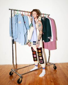James Ford Instagram - “This collection is a complete closet for folks with any identity. Rather than saying ‘gender neutral’ clothing, I call it ‘gender equal’. These days, you can’t look at any one piece & easily assign it to a menswear or a womenswear section. Lots of people try to do gender neutral clothing, but I haven’t neutralized anything. There’s cute heart buttons on a baseball jersey”. 

“Crochet on workwear is exactly what you wouldn’t expect, & that’s what makes it really compelling. I feel like I put my favorite masculine traits & my favorite feminine traits of clothing into a blender. I kept what I liked from both”. 

“I want the person wearing it to take a good look in the mirror, smile & confidently move on with their day. That feeling has nothing to do with gender & everything to do with wearing materials & aesthetics that make you feel cool, weird, & hot!”

“Since this is our first collection of the year & the second in the brand, I wanted to use it as an opportunity to tell people, ‘This is me. This is what I believe in’. This is my journey thus far in a single collection, & it all began with a need to make clothes that I needed, wanted, & couldn’t find.”

Designer @jamesdoinginsta on his 2023 Fall/Winter collection for @rowenasocialclub. Read more & see more looks at TheQueerReview.com. 

#jamesford #rowenasocialclub #fashion #genderequalfashion #lgbtqia #transowned #transownedbusiness #trans #transgender #thequeerreview #nextinfashion #lgbtq