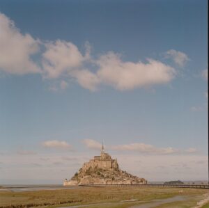 James Northcote Instagram - IMPOSSIBLE PLACES - I love fantastical worlds - its why I was obsessed with places like Mont St Michel when I was younger. Tonight I’m on the @wearewoolvs Twitter space talking all things fantasy, cons, acting in games and our new project @nowallslive #montstmichel #nowallslive #rolleiflex #kodakgold200
