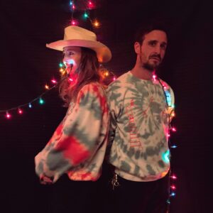 James Ransone Instagram - Hey guys… sorry I said I was gonna post Friday but now I’m doing it Monday. We blew our deadline because I got the flu and the inventory wasn’t ready to go online. BUT, it is now.

This is my friend @adelaidecrocker She used to answer the phones at my old management company, neither of us are there any more but we got along so well that she basically became my little sister. She’s one of the best humans I know. 
She also has a sick line called HUNK itnl. She chain stitches cool designs and phrases onto vintage clothes. Her brand doesn’t have a ton of awareness but it rules. Some other cooler more famous people than me have worn her stuff. I really wanted to help her blow it up, but at the same time I wanted to make some tie dyes for charity, SO we decided to kill two birds with one stone… (but lets be honest we are both piggybacking on the brains of @andy_muschietti and @stephenking for me having this many followers to begin with). This is my HUNK Xmas collaboration with her. Because each one made by hand, it was time consuming so there are only about 50 of them. I dyed these myself in my backyard in LA, then I gave them to Addy and she hand stitched the graphics over top in Ojai. 
And this is how the profit works- because her business is small, 50 percent goes into helping her build her brand, paying for a space, etc.

The other half, the half that’s mine, will get donated to the urban sanctuary project in LA. It’s a groundbreaking program that opens the doors of Blessed Sacrament church in Hollywood to the unhoused in between services on weekdays. The at risk community in  can go inside, rest, rejuvenate and get some food during the day. They don’t need to be a member of the parish, one can just go inside and take a nap to get out of the harsh sunlight or the cold. 
And also, because I hate sketchy charities, and because I believe in full transparency, I will post the receipts of ALL the transactions, including what my hard costs were. 
Anyway please tag one of your rich friends so we can sell them all this afternoon. Once they’re gone they’re gone!

Merry Xmas!  Link in bio!