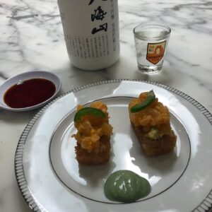 Jason Priestley Instagram - Day 360 of captivity: we have been working on making sushi lately... and I think tonight, we finally nailed spicy tuna on crispy rice... we actually ate all the tuna and I ended up making spicy tai... and it was super yummy! Also, the 3 year old snow aged @hakkaisansake was killer! But the best part, was  having dinner with my wife @naydoggy! #covidcooking #foodislife #happywifehappylife #luckyguy