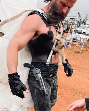 Jenny Beavan Instagram - ‘Finding Dementus’
Furiosa’s Dementus was not an easy character to get a grip on, ie to understand where he came from and what formed him ... I found inspiration in despots, ‘gurus’ and showmen - with elements of all appearing in the final costume.

His costumes were born in our tiny studio in Peckham, using motorbike gear, parachutes and of course a teddy bear! We tried all sorts of paint techniques, dye for the parachute, as well as various draping looks - well aware this could be a nightmare on a motorbike …!
Later in Australia we were able to fit Chris Hemsworth and refine the whole look to suit everyone’s vision, with the final costume being a collaborative exercise as it should be on any film. 

So here are some photos of the ideas on the stands, figuring it all out with Lauren Reyhani and Stephen Miles, fitting and working with Dan Blacklock, Chris’s Key Costumer in Sydney, before shooting in Broken Hill. 
It was a journey, but a wonderful journey to make with Chris and George.

@madmaxsaga 
@chrishemsworth 
@lauren_reyhani_costume 
@danblacklock08 
@jasinboland