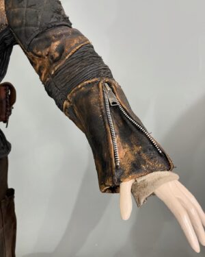 Jenny Beavan Instagram - And now our leading character - Furiosa. Also a voyage of discovery starting with the child in the ‘Green Place’ and ending as the look of Charlize Theron in Fury Road.

Producer Doug Mitchell called me in April 2021 when I was working in Prague - they wanted costumes for principal characters in a stunt sequence for Furiosa, which I had no idea was in the works! They needed to get a sequence in the can by June in order to benefit from a tax break from the NSW (Australian) government. So Lauren and I started doing collages and thinking through the various looks Furiosa would need in her progress through the story.

Moving back to London we started to put together found clothing and accessories to see what would work and communicate the look to our team in Australia. As I mentioned before, we had to do this via cyber space as we couldn’t get to Australia until the following January due to strict Covid quarantine in Sydney. But with a superb team there and some wonderful makers in London we managed to get an enormous amount of work done before we could set off. So exciting when Lauren and I finally got to our workshop in Chullora and started work with that extraordinary team of craftspeople .. and find Furiosa for real!

So here she is from collage to final look via various trial runs at the various jobs she gets to do and her disguises …  

@madmaxsaga 
@anyataylorjoy 
@lauren_reyhani_costume 
@jasinboland
