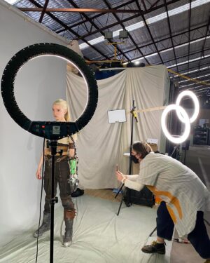 Jenny Beavan Instagram - And now our leading character - Furiosa. Also a voyage of discovery starting with the child in the ‘Green Place’ and ending as the look of Charlize Theron in Fury Road.

Producer Doug Mitchell called me in April 2021 when I was working in Prague - they wanted costumes for principal characters in a stunt sequence for Furiosa, which I had no idea was in the works! They needed to get a sequence in the can by June in order to benefit from a tax break from the NSW (Australian) government. So Lauren and I started doing collages and thinking through the various looks Furiosa would need in her progress through the story.

Moving back to London we started to put together found clothing and accessories to see what would work and communicate the look to our team in Australia. As I mentioned before, we had to do this via cyber space as we couldn’t get to Australia until the following January due to strict Covid quarantine in Sydney. But with a superb team there and some wonderful makers in London we managed to get an enormous amount of work done before we could set off. So exciting when Lauren and I finally got to our workshop in Chullora and started work with that extraordinary team of craftspeople .. and find Furiosa for real!

So here she is from collage to final look via various trial runs at the various jobs she gets to do and her disguises …  

@madmaxsaga 
@anyataylorjoy 
@lauren_reyhani_costume 
@jasinboland