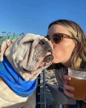 Jessica Knoll Instagram - We’ve lost Beatrice, our favorite thing in the world. I got to hold her and tell her I loved her as she passed, to thank her for loving me and napping with me and making my heart bigger and showing me how maternal I can be. We loved everything about her—her body, her hunger, her attitude, how she had to be involved with everything with us all the time, on us, touching us, butting her head into bathroom doors to guard us while we peed and showered and then her body was so bodacious we could never get the shower door back open. One time she jumped up on the table and ate a whole cake. When we had parties she would stalk the house like a predator, panting and wild eyed, bc food was around and she had to have it. She loved her daycare but ignored other dogs so I always wondered why she dragged me inside when we got there and came home so exhausted. Recently, I found out they let her hang out and snooze behind the front desk most of the day bc the dog area was “too much for her.” She was so ridiculous and I’m shattered she won’t ever bask in the sun or get her lip stuck on her teeth again. Snuggle up in the nook of my knees. Refuse to walk and eat first and second breakfasts and dinners. She lived like she would live forever and she was such a fighter and I’ll always take that with me. Thank you for loving her too, it brought me pure joy to share her with you on here. If you have a favorite memory of her I want to hear it. Talking about her and looking at pictures of her is all I want to do right now. 🐝 💔