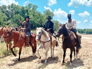 Jessica Oyelowo Instagram - The @sagaftra strike is over so I can post about @lawmenbassreeves 🥳🥳🥳 This is my first post because this is my favorite pic of @davidoyelowo that I took while we were shooting. It was hot, they were wearing woolen costumes, but the joy of riding alongside @tosin.morohunfola and #forrestgoodluck made everything amazing! David has been working on this project for 8 or 9 years in total. He saw a true overcoming hero in Bass Reeves and wanted to be part of telling his remarkable story. He has done that and then some. I had the privilege of producing the show alongside him and many other talented people. None of this is done alone, but someone has to lead the charge. My King David. You are astounding. Well done for never giving up on honoring Bass. Well done for starting with the right intention and finishing without flinching. Lawmen Bass Reeves has started streaming on @paramountplus. The first 2 episodes are out now. Episode 3 will drop on Sunday!! (I also play a small role in the show as David’s slave mistress. It’s weird.)