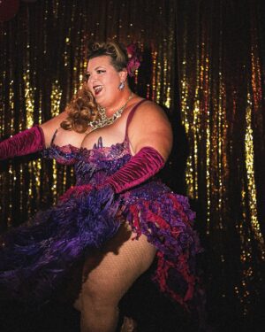 Jezebel Express Instagram - I love how much texture and motion you can see here:  velvet gloves, crinkled organza, fluttery feathers and tiny twinkling rhinestones. This is how I imagine I look onstage so it’s nice to see that it’s occasionally true. ✨❤️💃 Thanks @lynzmarie_photo for capturing this!