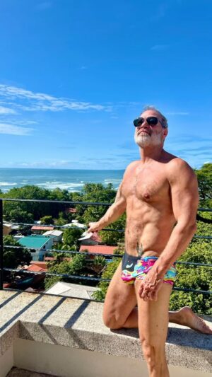 Jim Newman Instagram - It’s always a struggle between finding your light and looking like a poser or just accepting that you’re trying to take a picture at the wrong time of day, with the wrong kind of lighting . so I just went with looking like a poser and finding my light! #strikeapose #daddies #speedos #daddiesnspeedos