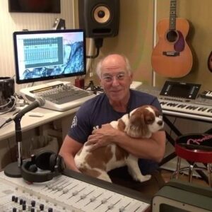 Jimmy Buffett Instagram - If you ever wondered what a fly on the wall would see in Jimmy's home studio late at night.....it would usually look something like this. 

This is from June, 2015 - practicing 'Ripple' before he did his part in a @playing4change video filmed at the Montauk Lighthouse. 
With two of his favorite fans in the audience.