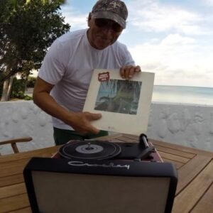 Jimmy Buffett Instagram - Jimmy used to go to a little salty piece of land in the Bahamas whenever he had time for quick R&R. A golf cart only kind of place... the fishing & blue waters the Bahamas are famous for. He sent a video of the patio magic hour with nothing but the sounds of the ocean and A1A on the turntable. The only problem? The audio cable didn’t work so it’s just the record spinning with no sound 😀
Was still awesome when trimmed to the ending because this was JB in one of his favorite places.