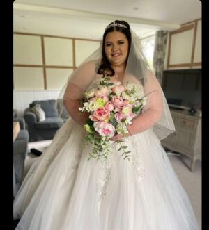 Jo Cooke Instagram - Lauren was one of our brides whilst we were filming Curvy Brides Boutique. Throughout her appointment Lauren was extremely brave and honest and shared how she had battled with her mental health in the past which had resulted in her self harming. 
Having embraced her scars, Lauren chose this stunning strapless dress. 
Lauren had very kindly agreed to share her experience 
“I was very nervous to try on a dress let alone when it was going to be on TV! 
I was also scared about showing my scars, as you know I wanted a dress with sleeves to hide them but Jo and Al helped me build confidence into owning my scars. I shouldn’t be ashamed of them they tell a story of what I have been through and show I got through it and I hope my episode helped other people that things do get better, My dress made me feel powerful and like a new woman and I felt so beautiful and that’s all Down to Jo and Al x” 

Lauren’s story can be seen in Season 4 episode 1 of Curvy Bride’s Boutique #curvybrides #curvybridesboutique #embraceyourself #confidence #mentalhealth #mentalhealthawareness #love @mentalhealth__community