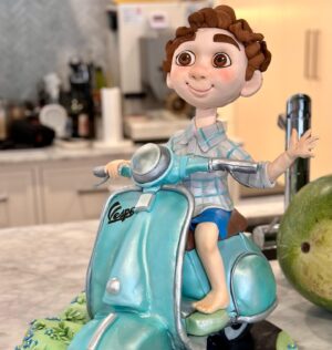 Jock Zonfrillo Instagram - Alfie’s 5th Birthday Cake - he is obsessed with Luca and Sicily so his wish was my command! 

Well actually, it was @creativecakeartmelbourne who sculpted and decorated Luca@on his Vespa, and @meorthecake who made the mud cake inside!