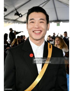 Joel Kim Booster Instagram - Happy Indie Spirits day! Today’s look giving secret prince of a made up country in a Netflix romcom. PrincESS of Genovia teas. 

Styled by @chrishoran20 with assist from @sanamceline and @danenikkoalvero 
The look: @helmutlang @doxpeter @camper @davidyurman 
The beat: @tracyraffelsonmakeup
Pin: #artists4ceasefire 🫶🏻