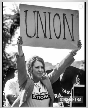 Joely Fisher Instagram - It was thrilling to be your Mistress of Ceremony yesterday. I am still reeling from the solidarity, the energy, the support. Our siblings were out in FULL FORCE. We could see from the stage…a sea of laborers  standing together…this is a movement of the entertainment industry and American worker. The eyes of the world and the global labor revolution are upon us as we say ENOUGH!!! ENOUGH to low wages that don’t keep up with inflation, ENOUGH to unsafe working conditions, ENOUGH to technology that is de-humanizing, ENOUGH  to devaluing our work. Make no mistake we are at critical precipice, the very existence of our jobs is at stake. Today we stand together , shoulder to shoulder to remind corporate America that they can’t do it without us. We storytellers, who have empathy, passion and courage…all@the things required to tell@human stories.
#union #solidarity #madamesecretary #normarae #holdtheline #sagaftrastrong #sagaftrastrike #sagaftramembers #wgastrike #wgastrong #iatse #teamsters #dga #liluna #afm #aflcio #siblings #sistersandbrothers #doyouhearthepeoplesing #revolution