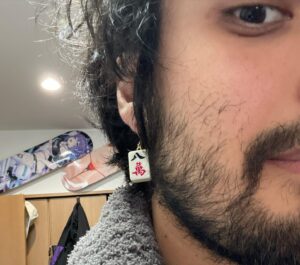 Joey Bizinger Instagram - Matching mahjong earring 🀄️   tie dye Led Zeppelin shirt   Gelato Pique Nintendo cardigan   grey sweatpants = fit of the day