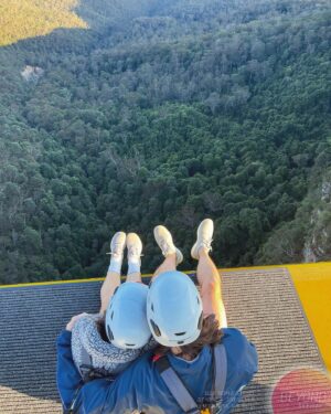 Joey Richter Instagram - 🧗🏻‍♂️WILD Australian Photos Incoming 🌄 On me & @slowpez8’s lil post-tour adventure in the #BlueMountains of NSW ⛰️, we were treated to the MOST special experience at @scenicworld_aus! During our time there we discovered firsthand that the Blue Mountains are maybe the most beautiful place in the world?? (Top notch rec from @a.j.holmes 🥇) #ScenicWorld_Aus is located in Katoomba, a mountain town that overlooks the 🤩BREATHTAKING🤩 Jamison Valley, which features the iconic #ThreeSisters 🏜️ (needless to say, it’s all fuckin stunning!). Scenic World offers 4 main attractions: Scenic Walkway 🦕 (endless rainforest paths feat. Dinosaurs — like in Slide 9), Scenic Railway 🚃 (steepest in the world!), Scenic Cableway 🚠 (ALSO steepest!), & Scenic Skyway 🚟, which sits 270 meters above the canopy below 😳

But then there #BeyondSkyway 😎 Something that I’d NEVER think I’d have the chance to do… but did!! Not only did we ride the skyway out into the center of the valley, but we got strapped in to climb ON TOP of the car 🫣 & privately enjoy the sunset w/ hot chocolate and champagne 🥂 I couldn’t fuckin’ believe it!

Now I’m prone to death-defying experiences only SLIGHTLY more than Lauren (exhibit A - her face in Slide 2)🪂 But our wonderful guide, Tony, could not make us feel safer while also encouraging us to lean out and soak in the landscape 🌅 PLUS he put up with our ONE MILLION questions about weather/how secure our rig was/the structural integrity of the cable car 🤔🤦🏻‍♂️

It was an unforgettable afternoon and I’m SO glad we worked up the courage to go for it! 🎢 Enormous thanks to Tony (pictures in Slide 10!), the whole Beyond Skyway team for being so nice to us (& also answering so many questions 🧐), & @bernsokol for being SO generous to set up this once-in-a-lifetime experience for us! 🥰
.
.
.
#explorebluemountains #australia #nswparks #skyway #daredevils #sunsetview #marriedlife💍 #coupleswhoclimbontopofcablecarsSTAYtogether